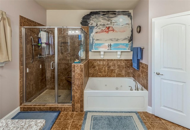 bathroom featuring tile patterned floors and shower with separate bathtub