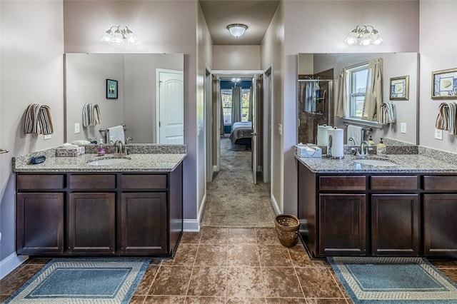 bathroom featuring vanity and an enclosed shower