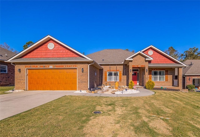 craftsman-style home featuring a garage and a front yard