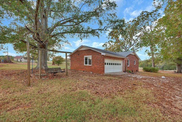 view of side of property featuring a garage