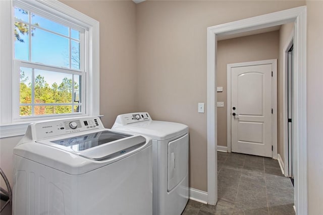 washroom with separate washer and dryer