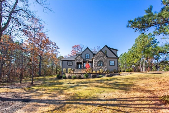 view of front of home featuring a front yard