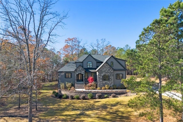 view of front of home featuring a front lawn