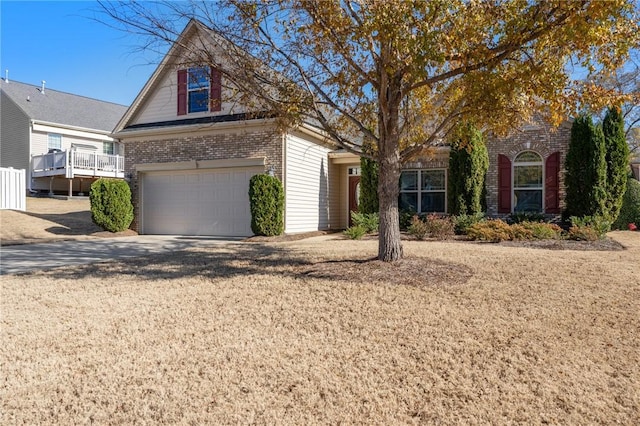 view of front of home with a garage