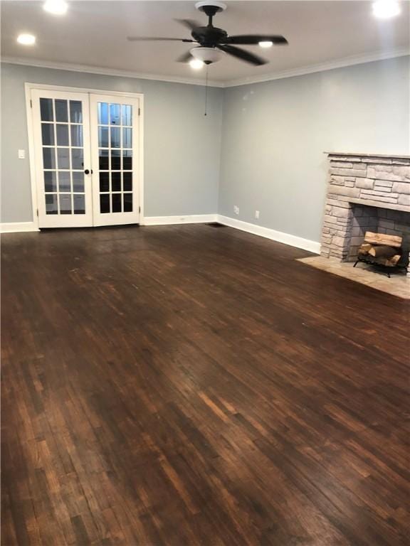 unfurnished living room featuring french doors, ceiling fan, and crown molding