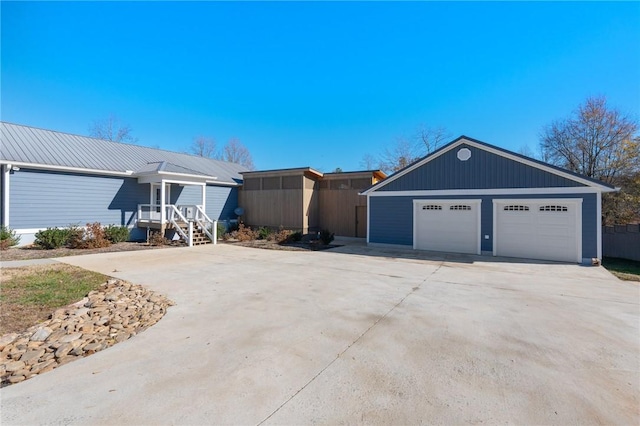 ranch-style home with a garage