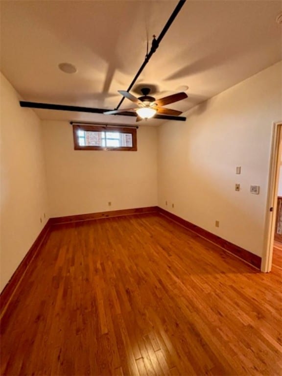 spare room featuring hardwood / wood-style flooring