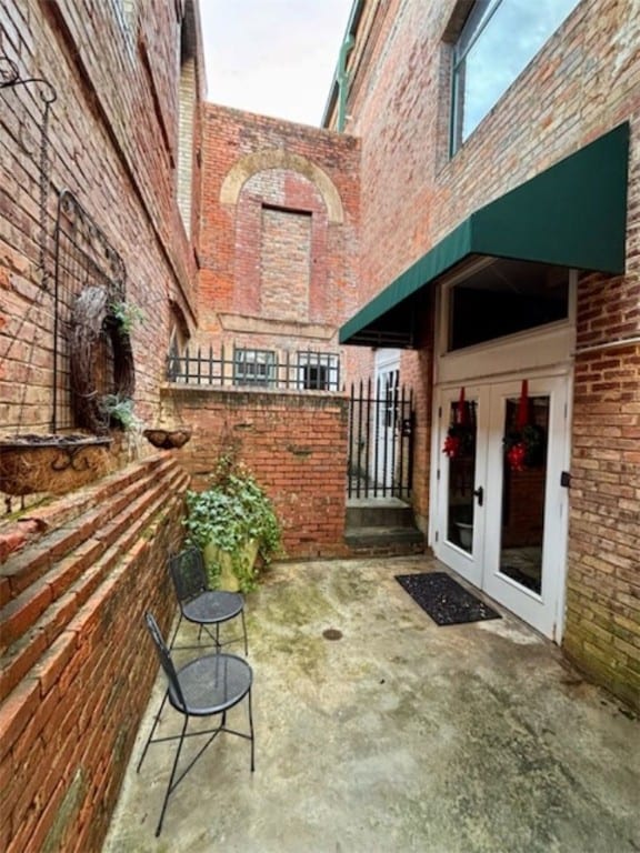 view of patio / terrace featuring french doors