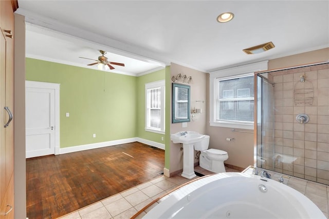 bathroom with separate shower and tub, ceiling fan, crown molding, hardwood / wood-style flooring, and toilet