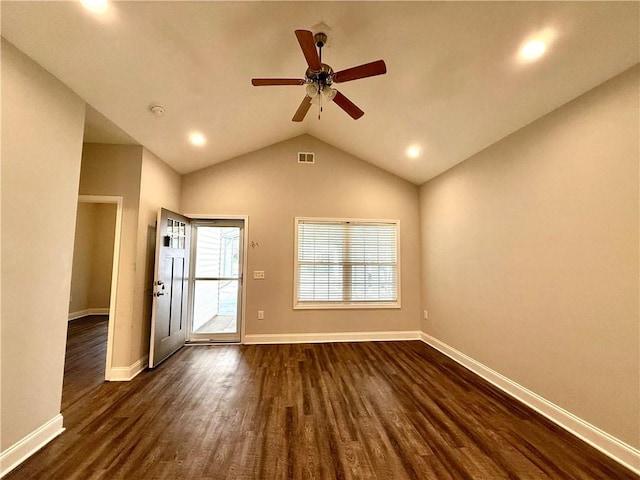 interior space featuring ceiling fan, dark hardwood / wood-style flooring, and lofted ceiling