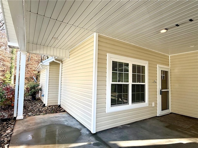 entrance to property featuring a patio area