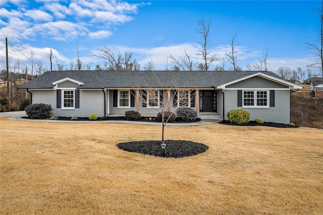 ranch-style house with a front yard