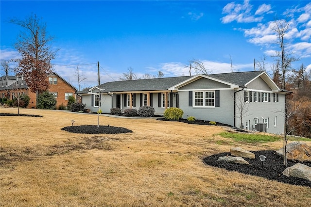 ranch-style home with a front lawn