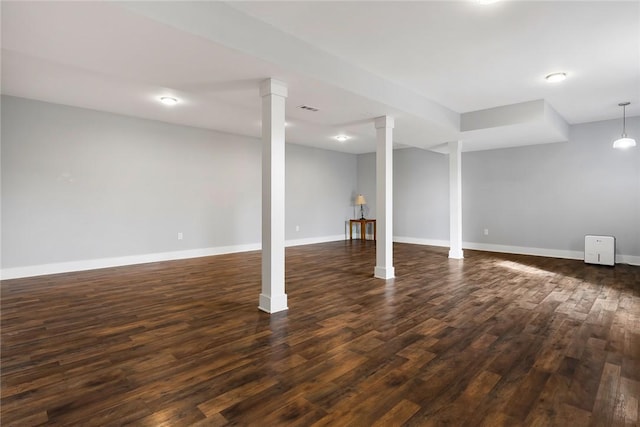 basement featuring dark wood-type flooring