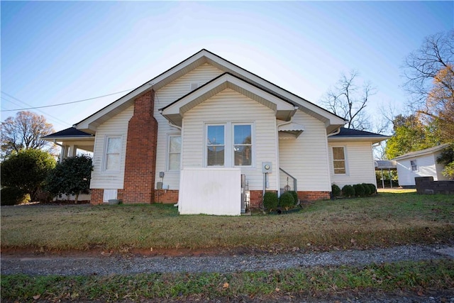 exterior space with a front yard