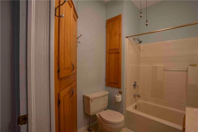 bathroom with shower / tub combination and toilet