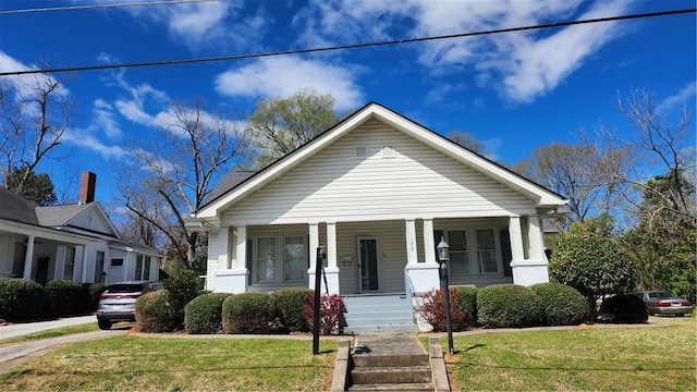 102 Wardlaw St, Abbeville, SC 29620 - view of front of house featuring a front yard and a porch