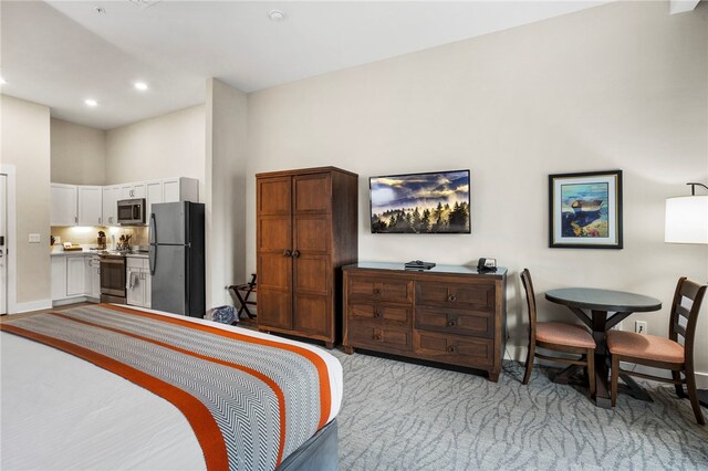 13500 Clemson Blvd Unit 2108, Seneca, SC 29678 - carpeted bedroom featuring stainless steel fridge