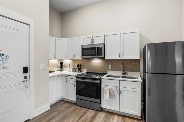 13500 Clemson Blvd Unit 2108, Seneca, SC 29678 - kitchen with stainless steel appliances, white cabinetry, hardwood / wood-style flooring, and sink