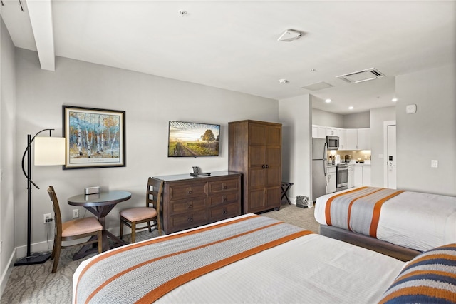 carpeted bedroom featuring stainless steel fridge