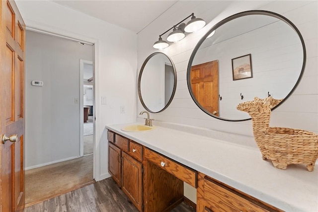 bathroom featuring vanity and wood-type flooring