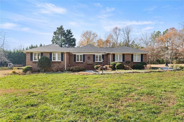 ranch-style house with a front lawn