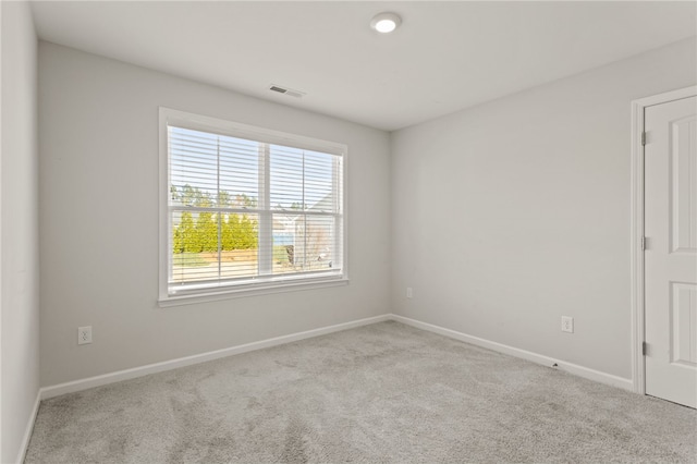 view of carpeted spare room