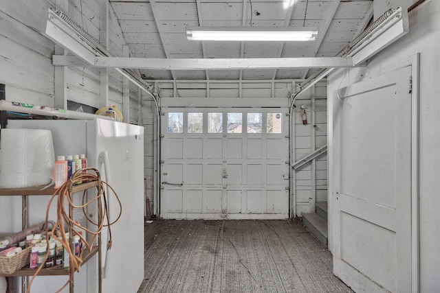 garage featuring white refrigerator