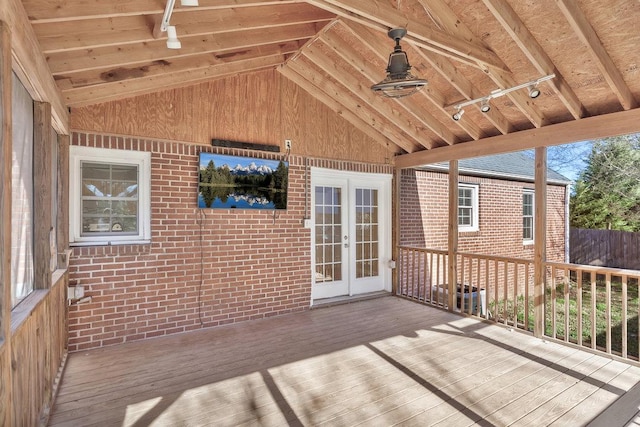 wooden deck featuring french doors