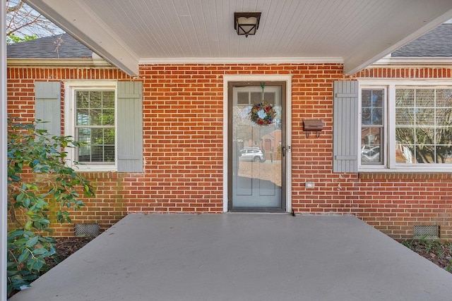 entrance to property with a patio area