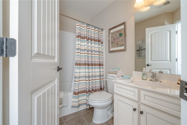 full bathroom with tile patterned floors, vanity, shower / bath combination with curtain, and toilet