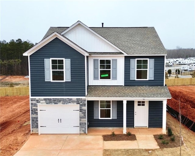 view of front of property featuring a garage