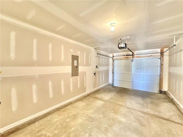 garage featuring a garage door opener and electric panel