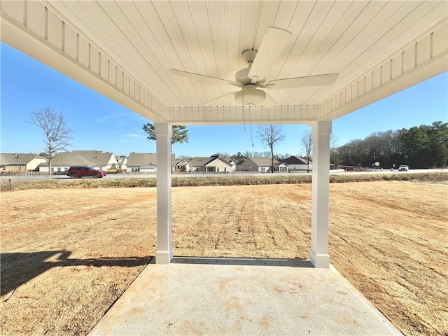 view of yard with ceiling fan