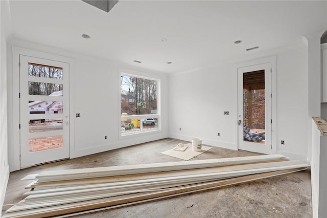 interior space with crown molding