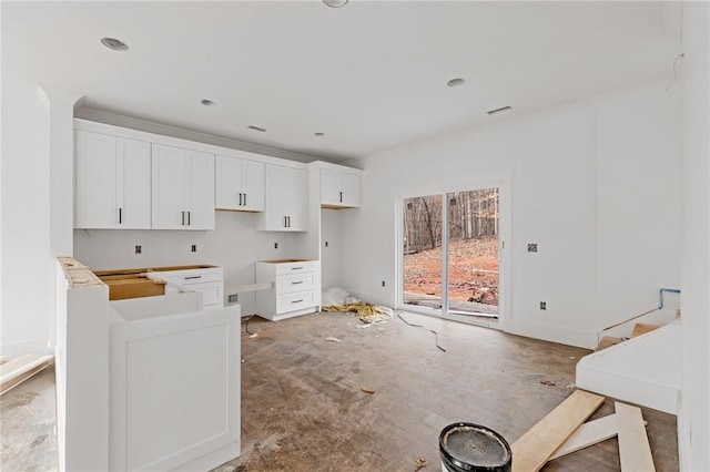 kitchen featuring white cabinetry