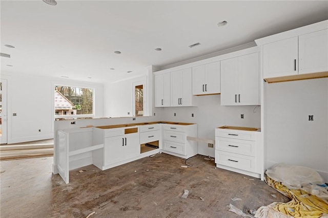 kitchen with white cabinets