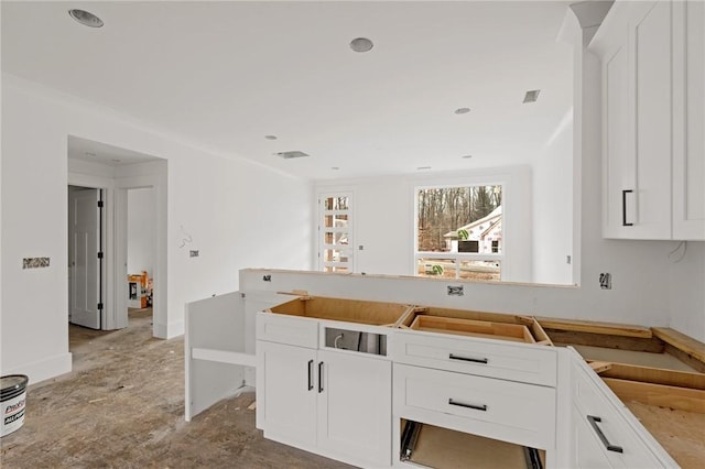 kitchen featuring white cabinets