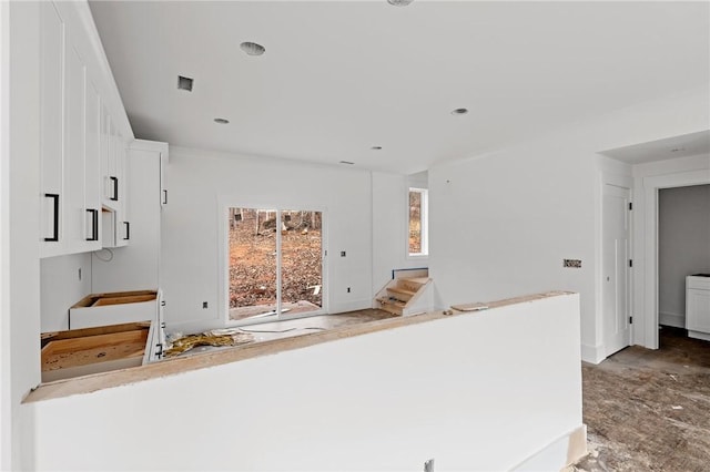 kitchen featuring white cabinetry