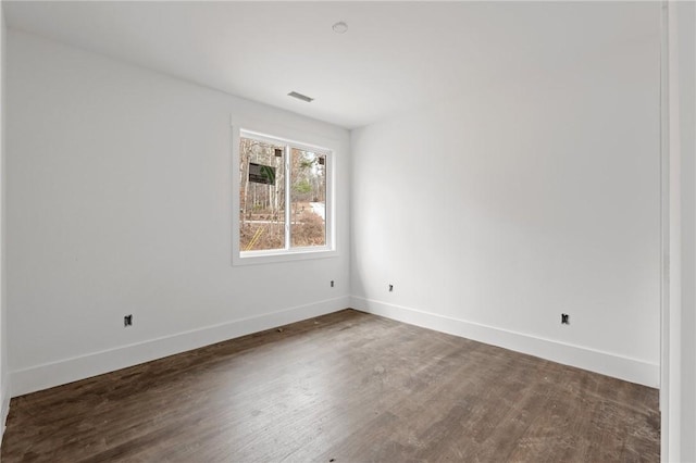 empty room featuring hardwood / wood-style floors