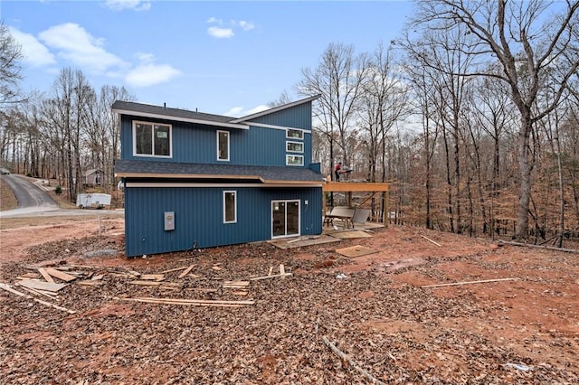 back of house with a patio area