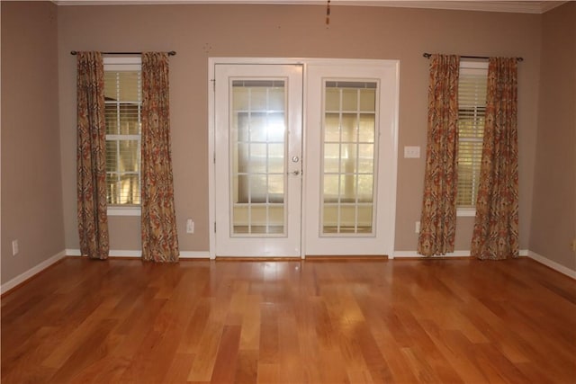 entryway with light hardwood / wood-style floors