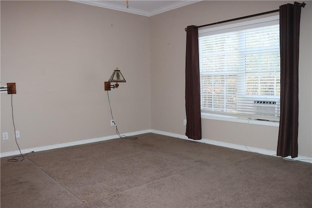 empty room featuring crown molding