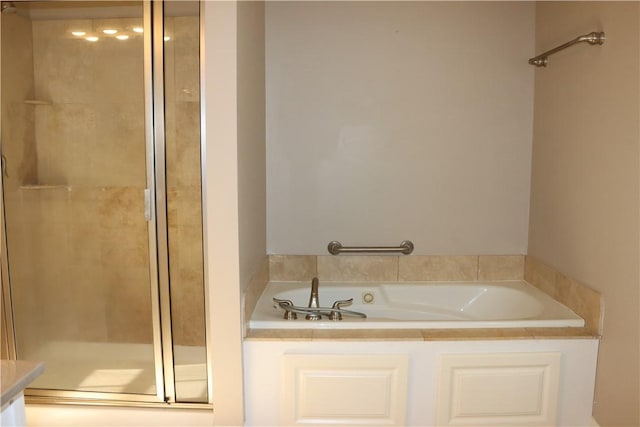 bathroom with independent shower and bath