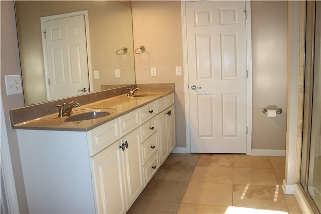 bathroom featuring tile patterned floors and vanity