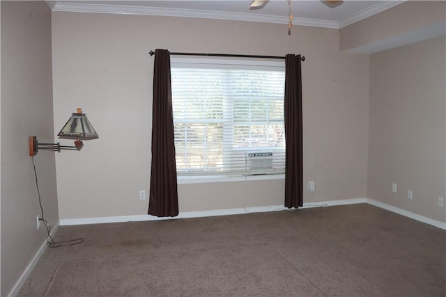 spare room featuring carpet, ceiling fan, and ornamental molding