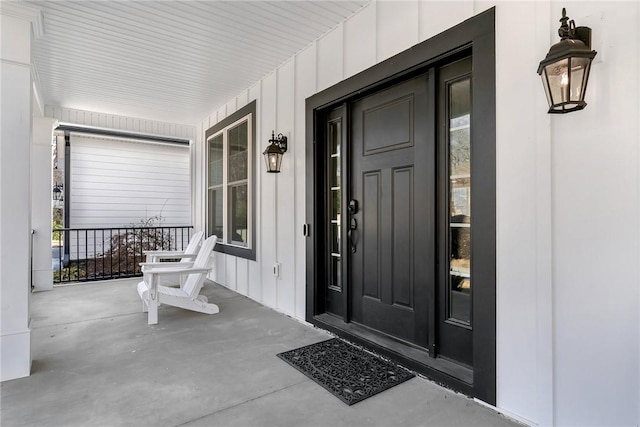 entrance to property featuring a porch