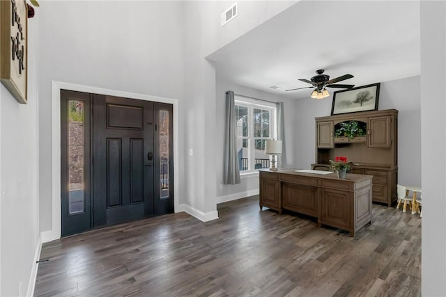 entryway featuring dark hardwood / wood-style floors and ceiling fan