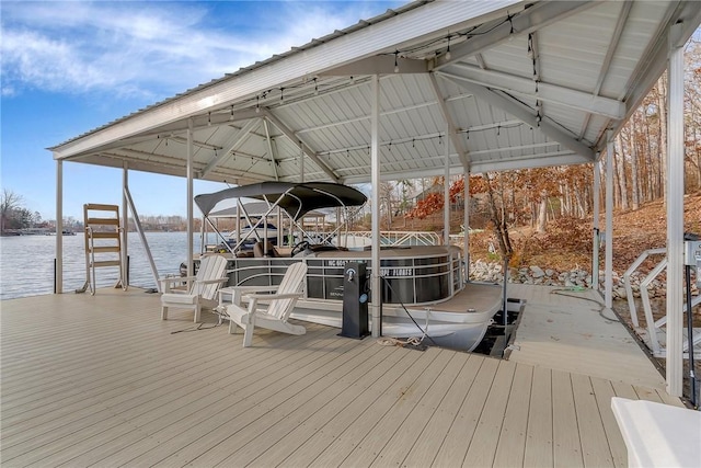 dock area with a water view