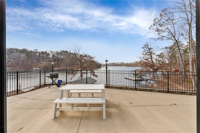 view of patio / terrace featuring a water view